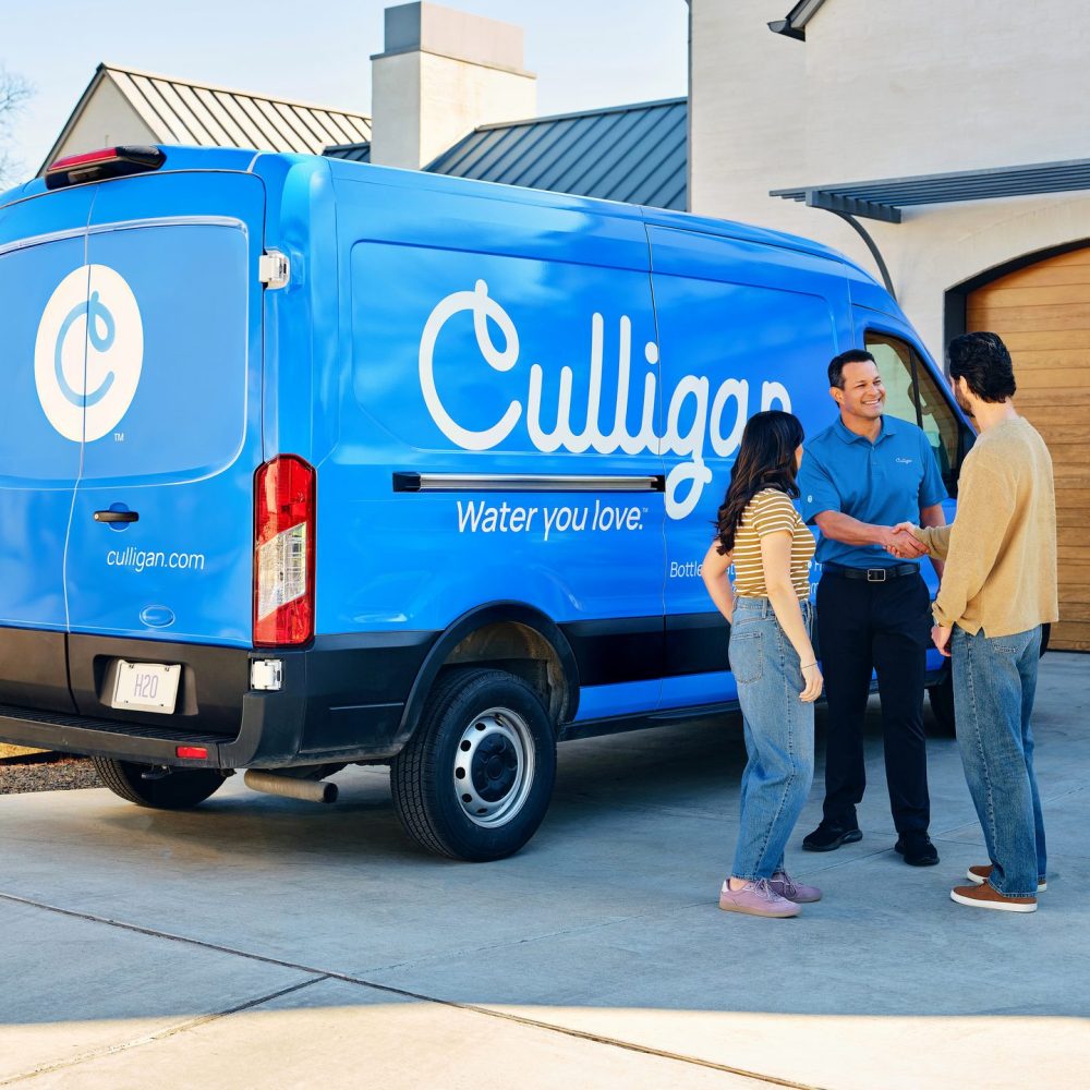 Culligan_Man_Shaking_Hand_Couple_In_Driveway_V2_8_7_2026_5_41_10_PM